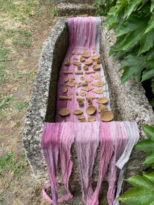 Votives and mulberry textile fragments